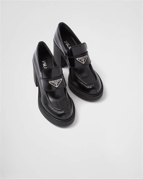 prada buckle loafers|Prada high heeled loafers.